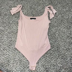 Soft bodysuit with ties